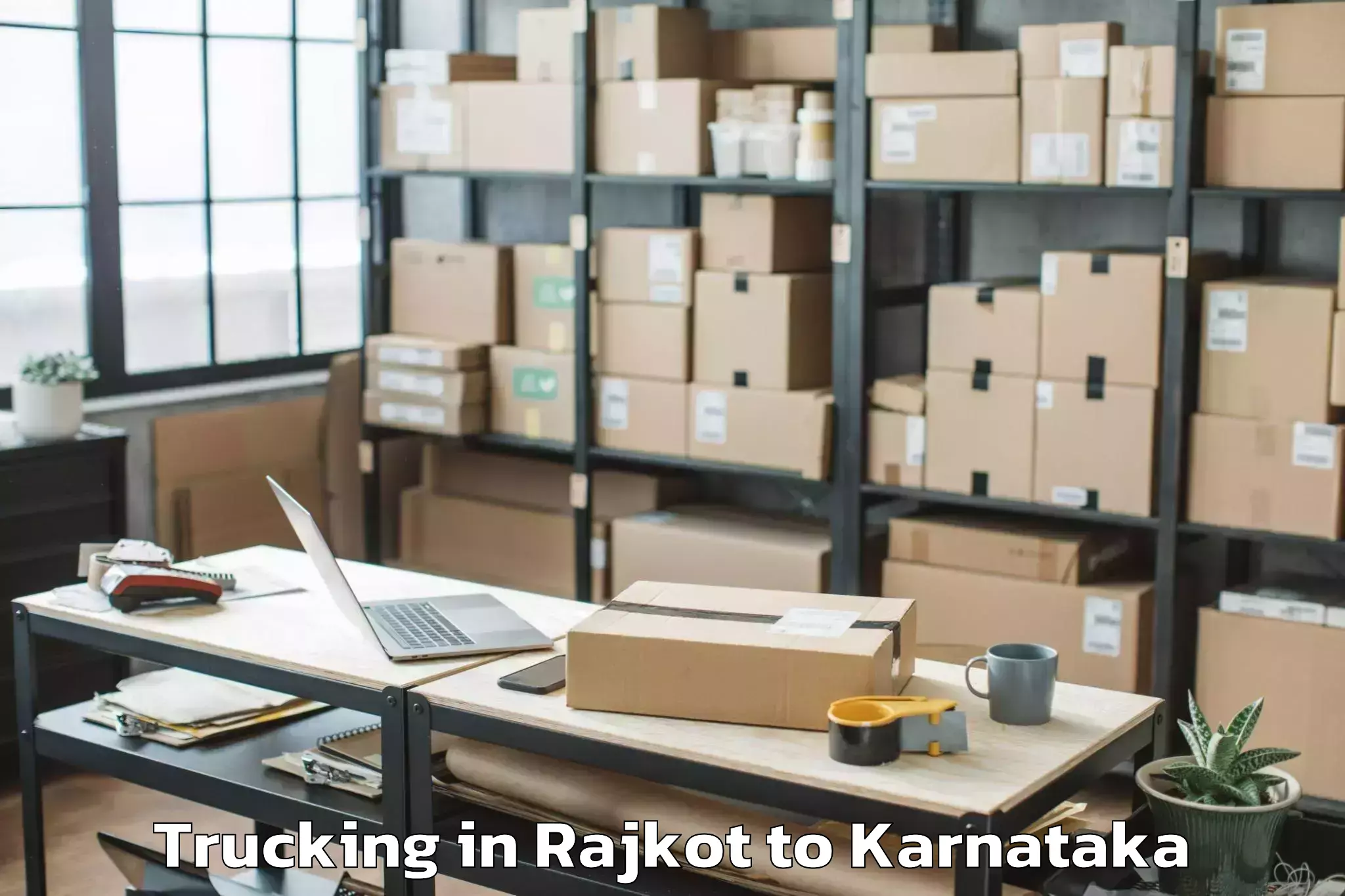 Leading Rajkot to Krishnarajpet Trucking Provider